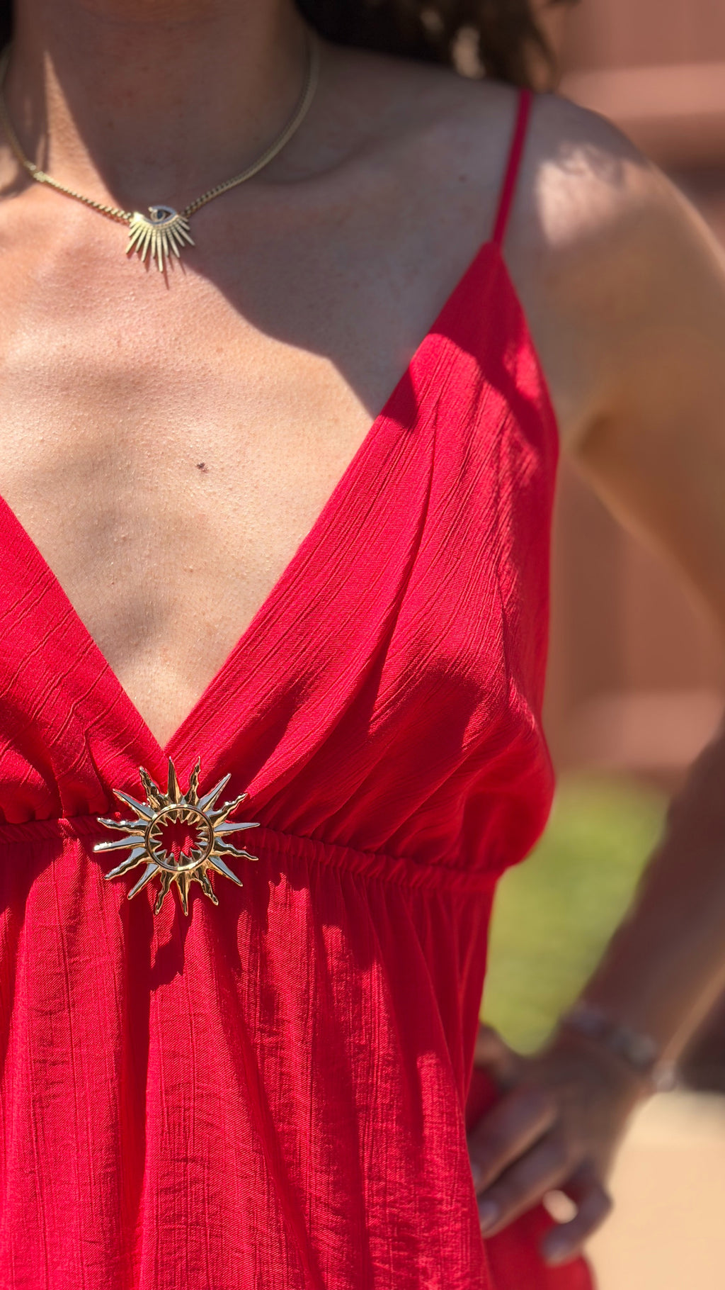 Robe courte broche soleil