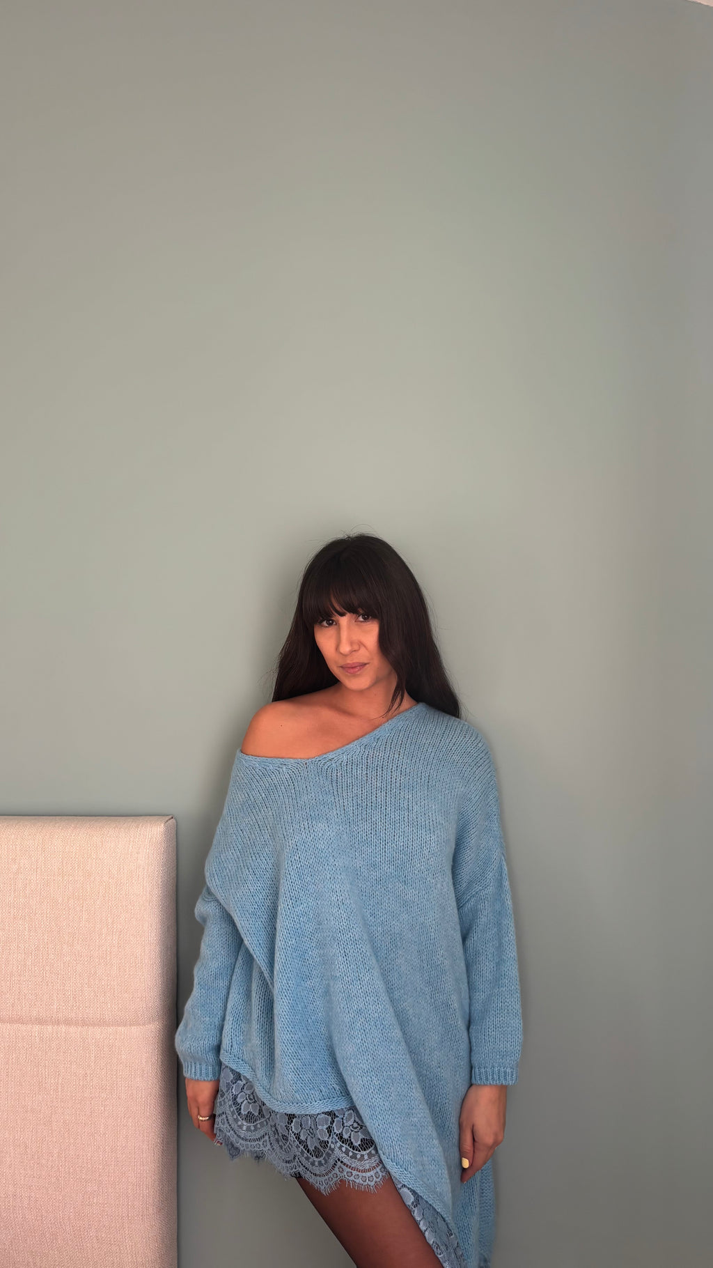 Pull asymétrique dentelle